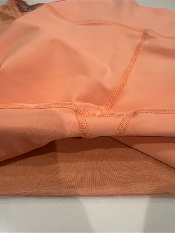Peloton Orange matching set size large pants and‎ small tank top - Image 6