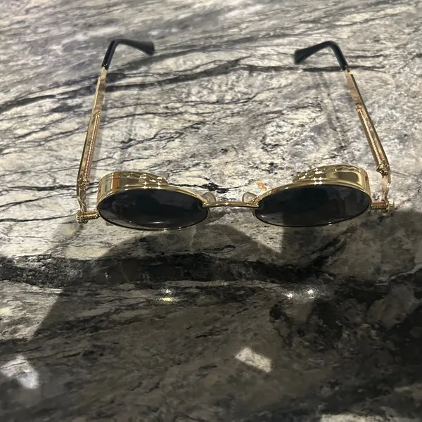 Round Gold and Black Sunglasses - Image 11