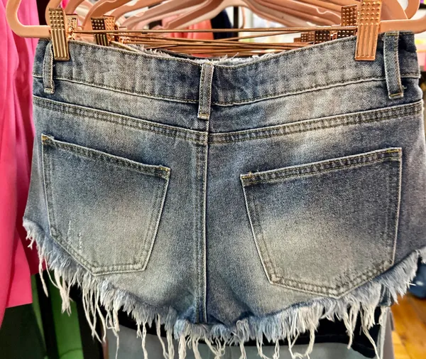 Edikted Medium Wash Jean Shorts - Image 7