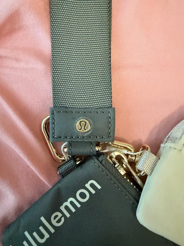 Gray and white Lululemon dual keychain - Image 2