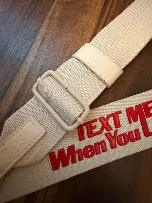 BEIS Lonely Ghost “Text Me When You Land” beige Travel Bag Strap with Red Text - Image 3