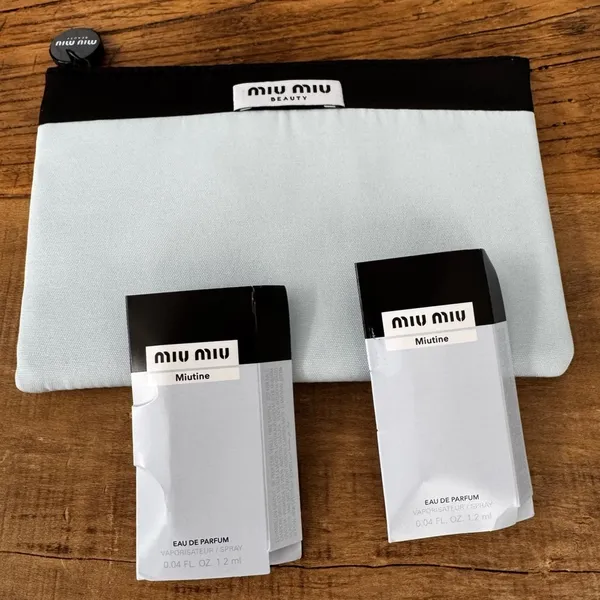 BEAUTIFUL Light Blue & Black Miu Miu Cosmetics Bag w/ TWO perfume samples! NEW - Image 2
