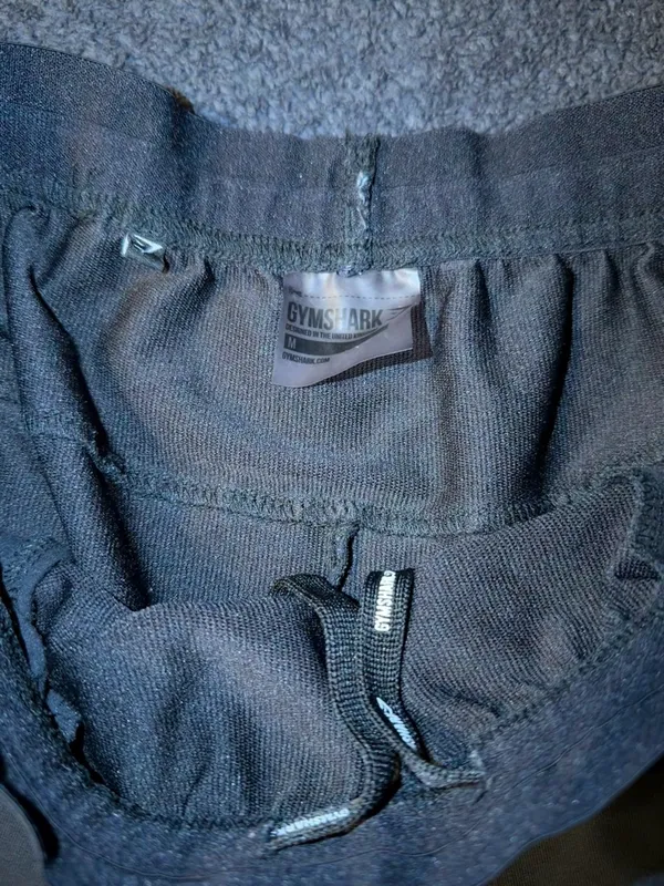 Gymshark Black Tapered Track Joggers with Side Logo - Image 3