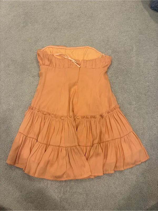 Saints + Secrets Strapless Ruched Tiered Midi Dress in Peach Orange - Image 2