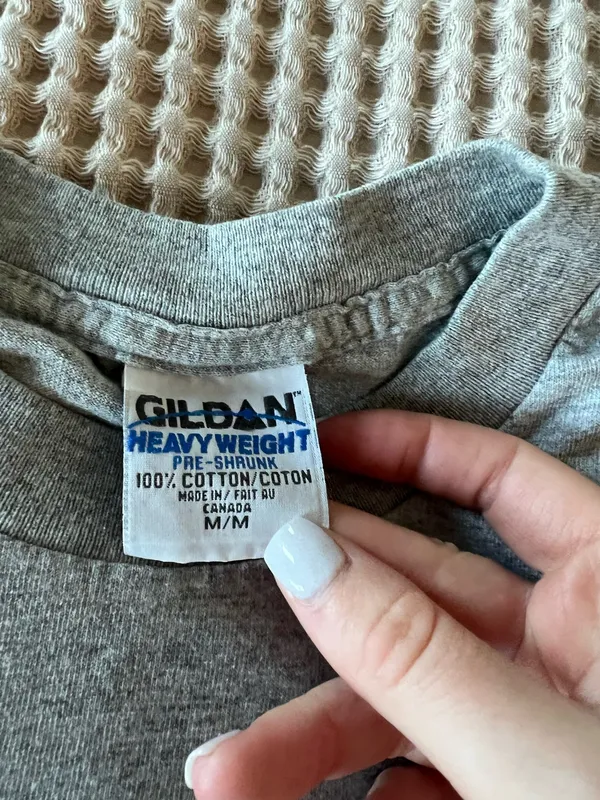 Gildan Classic gray short-sleeve tee featuring a small New Orleans Louisiana graphic on the chest. Comfortable cotton blend with a relaxed fit. Versatile gray color pairs well with casual outfits. Ideal for everyday wear and travel. - Image 3
