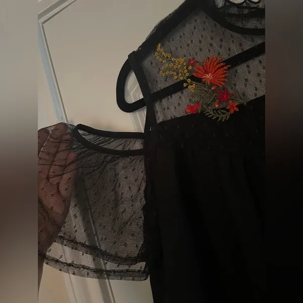 Black off the shoulder top with sheer mesh sleeves and embroidered flowers - Image 4