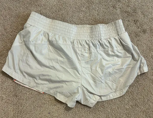 Free People Movement white shorts w/pink stitching - Image 4