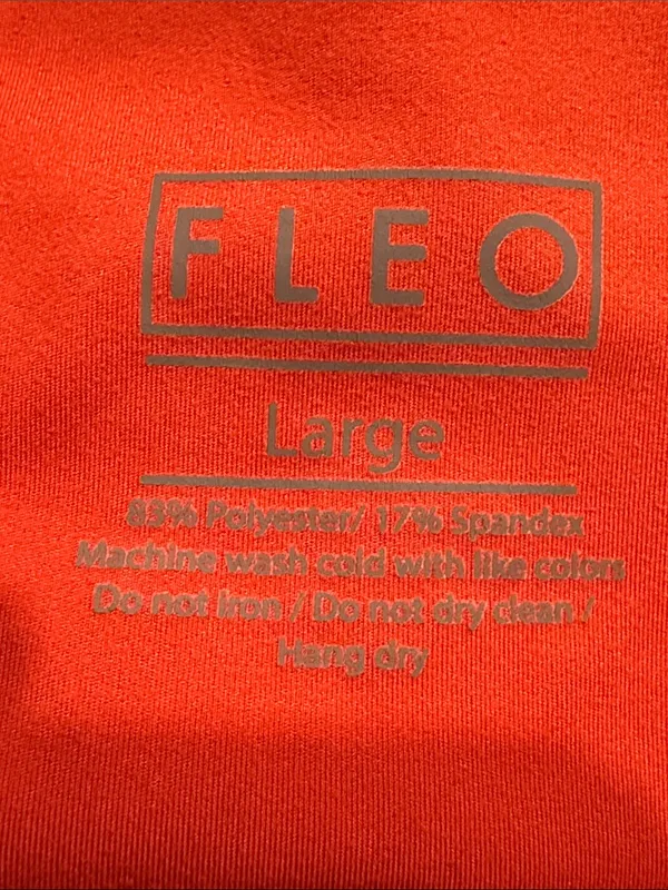Fleo orange leggings size large . - Image 2