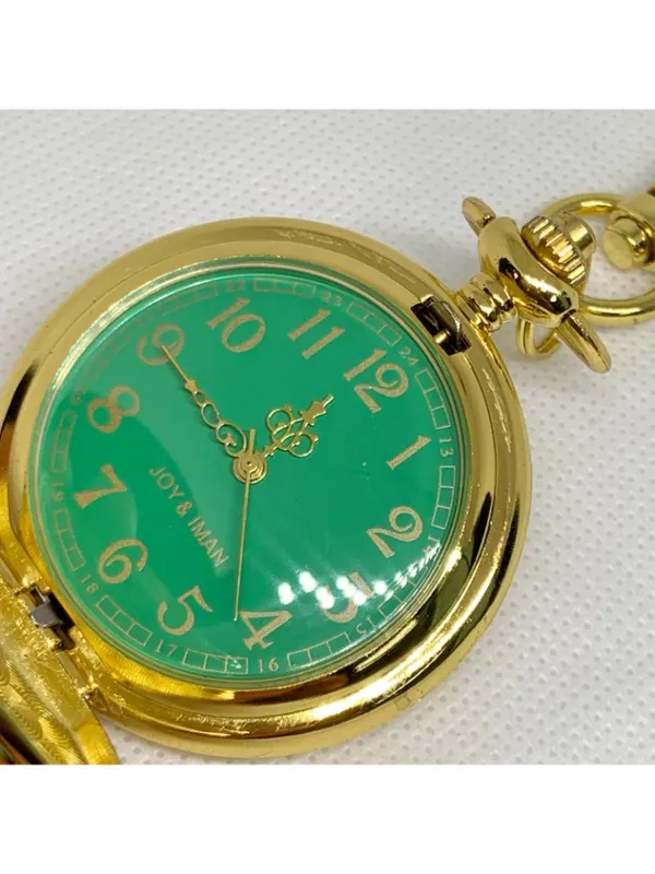 joy & iman Women’s gold tone pocket watch green dial Quartz analog 46mm running - Image 2