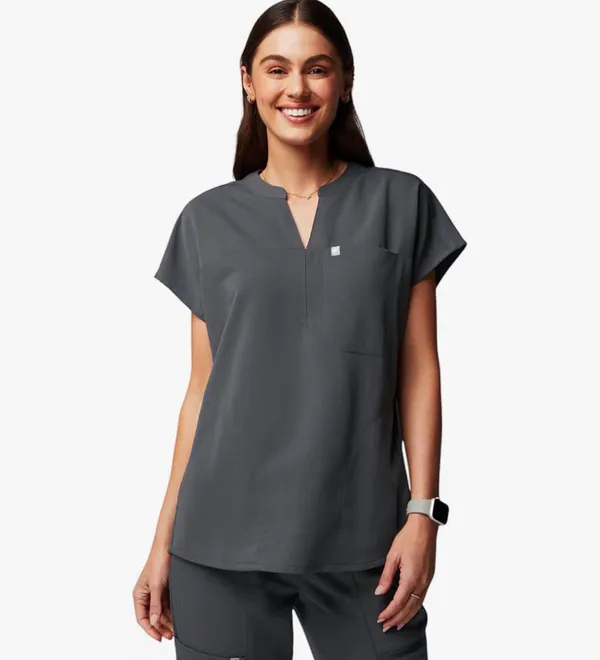 Fabletics Women's Evolve 3-Pocket Scrub Top with an Oversized Fit - MotionTech, 4-Way Stretch, Wrinkle-Resist, Anti-Shrink - Image 2