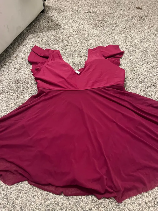 Stylish red swim dress with a flattering wrap design. Perfect for beach outings. - Image 8