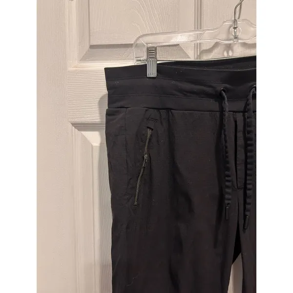 Athleta Pants Trekkie North Jogger Womens 12 Travel Hiking Gym Zip Pockets Black - Image 2
