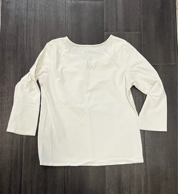 Soft cream long sleeve top with a modest scoop neckline. Features a small decorative ring keyhole at center front. Lightweight, easy to layer for casual or office wear. Simple, clean silhouette for versatile styling. J, Jill size medium. 95% cotton 5% spandex - Image 5
