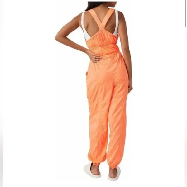 Free People Movement tropic sport one piece orange jumpsuit. Size medium - Image 2