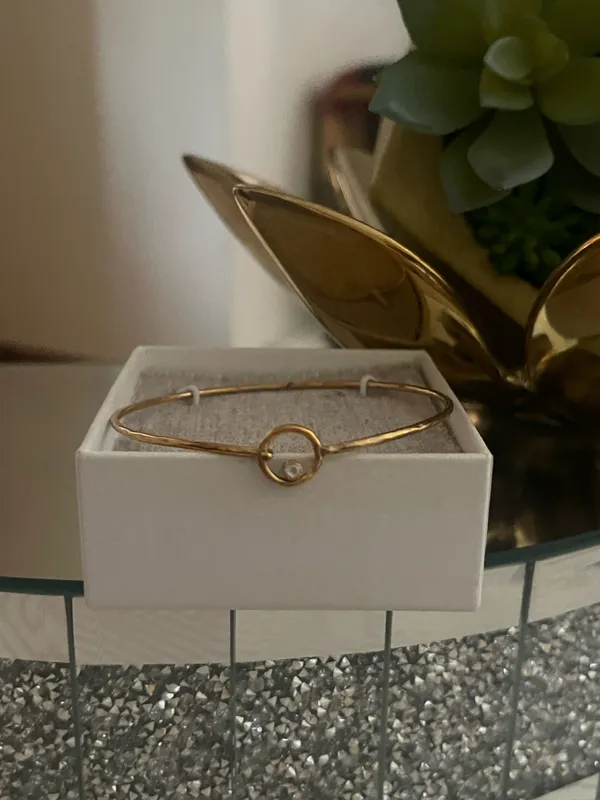 This is a Pura Vida bracelet featuring a dainty gold-tone wave charm - Image 7