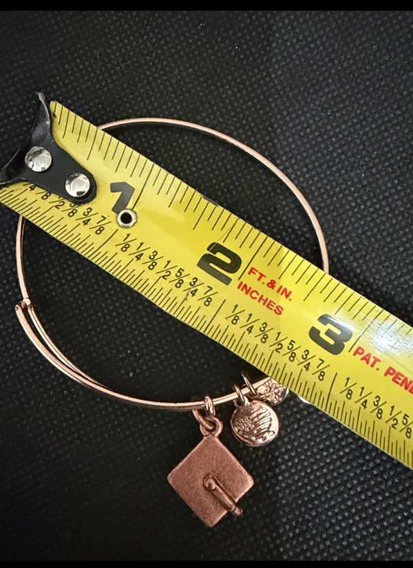Vintage Alex & Ani Rose Gold-Tone Bracelet with Graduation hat charm. excellent used condition. Measurements approximately 2 1/2”. Non-smoking home. Priced to sell at as is condition. Don’t like my price, make a reasonable offer! - Image 5