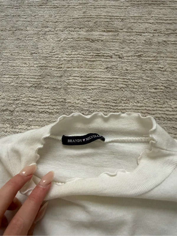 Brandy Melville White Ribbed Lettuce-Edge Long Sleeve Crop Top (One Size) - Image 4