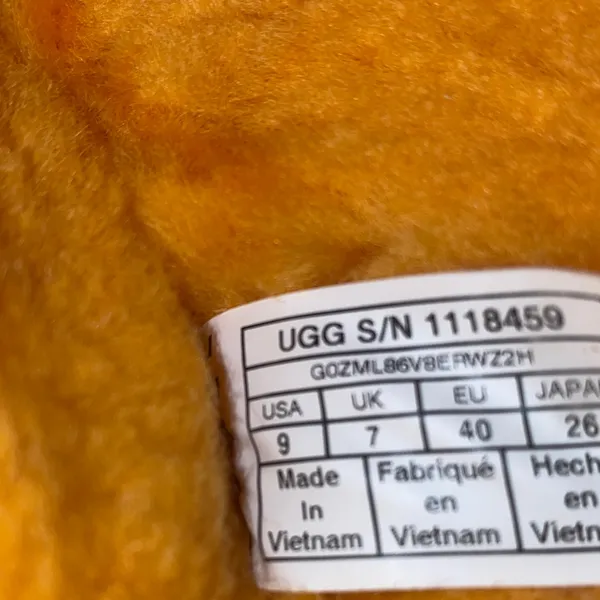 UGG 9 Vibrant Orange Fluffy Slippers - Image 4