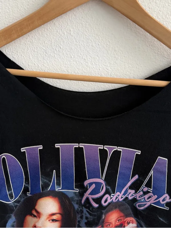 Olivia Rodrigo off-the-shoulder black graphic tee - Image 4
