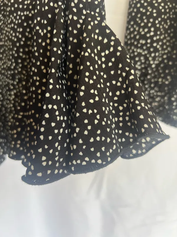 Luxxel Black and White Polka Dot Long-Sleeve Fit-and-Flare Romper - Image 6