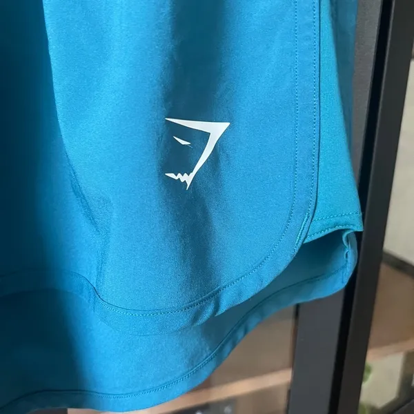 Gymshark Running Shorts athletic band teal green blue workout flowy stretchy low - Image 2