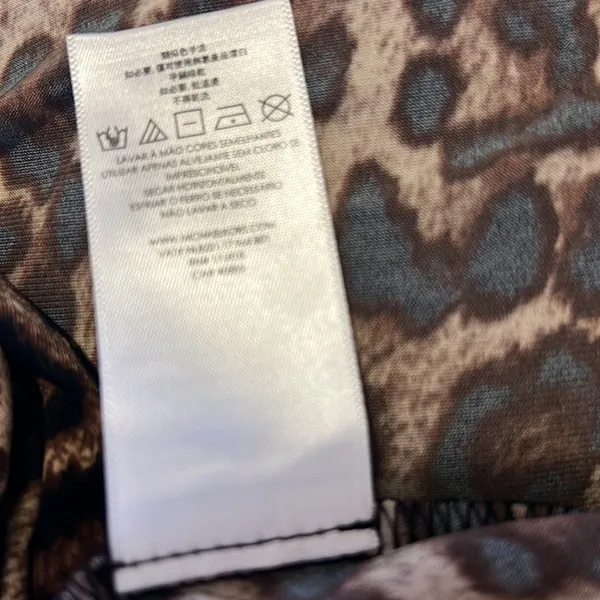 Michael Kors stretchy leopard pullover top w gold logo clasp NWOT - Image 11