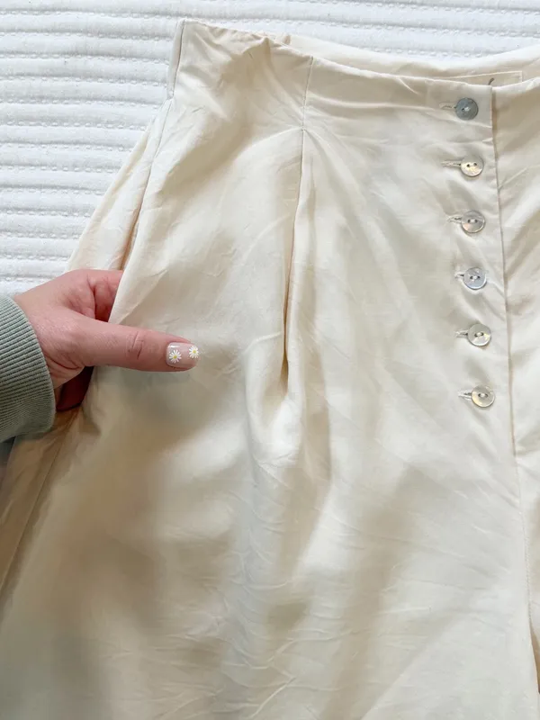 100% Silk High-Waist Wide Leg Lined Pants in Ivory with Mother of Pearl Buttons - Image 9