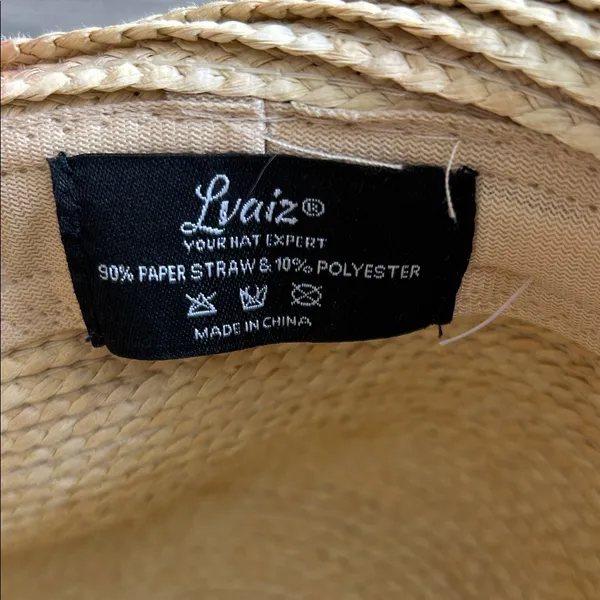 Elegant Cream Sun Hat with Black Band - Image 6