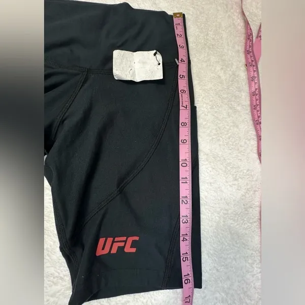 UFC Women's Black Bike Shorts with Red Logo and Side Pockets - Image 10