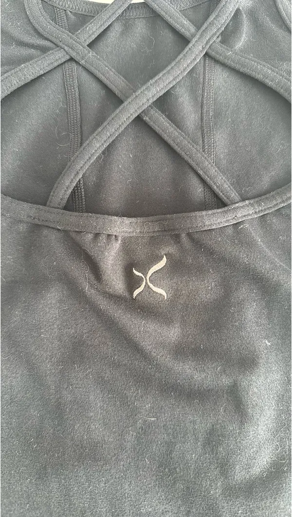 Capezio black tank top with cut out design on back. Size large child - Image 2