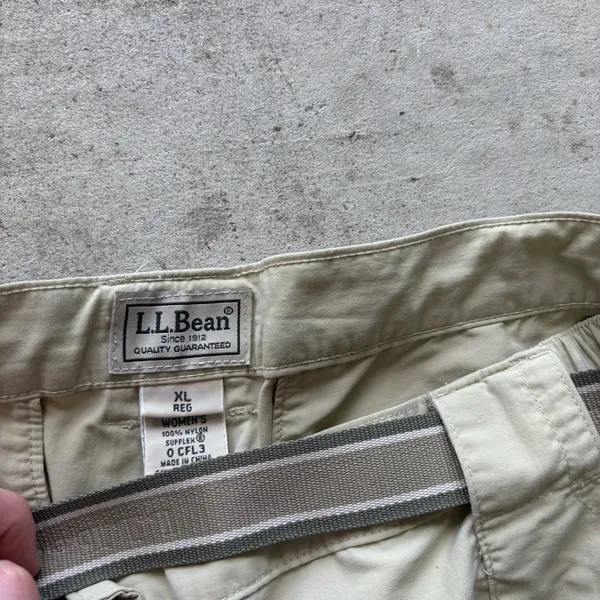 L.L. Bean convertible cargo hiking pants feature a built-in webbed belt and zip-off lower legs. - Image 3