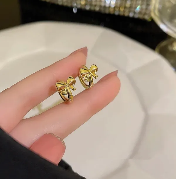 Gold Bow Hoops Earrings - Image 2