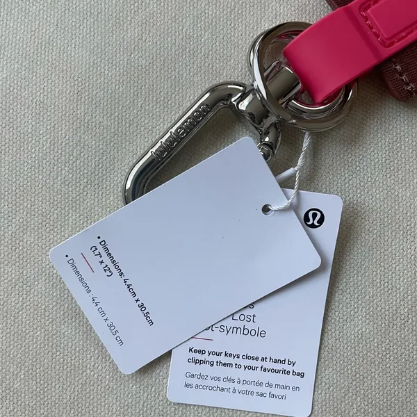 Lululemon Never Lost Keychain Wordmark - Ancient Copper/Glaze Pink - Image 2