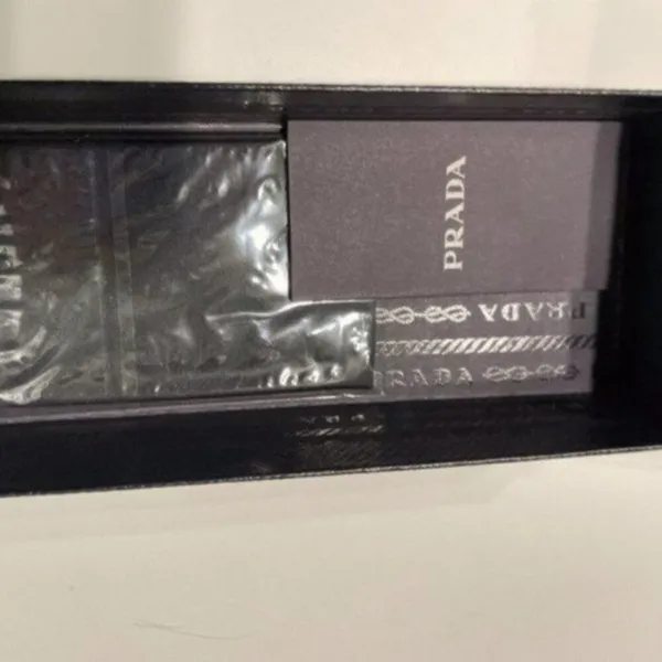 Prada 61mm Oval Sunglasses silver - Image 12