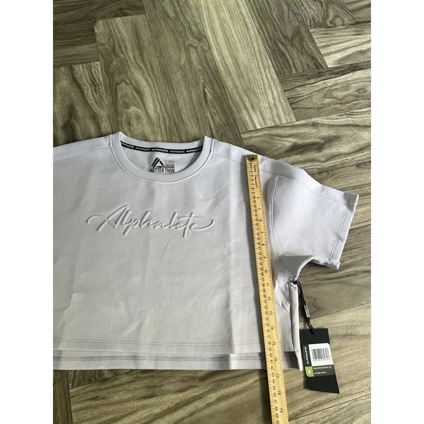 Alphalete Woman’s ELMTS Short SLEEVE Crop - Lilac ,Size Medium - Image 7