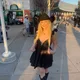 Kaci M.