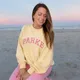 Lindsay M.