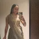 Neela M.