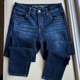 NWOT American Eagle Super Stretch Hi-Rise Jegging size 8 with acid washed areas Photo 0