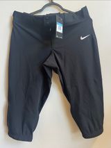 Nike Softball pants Black Capri Workout Pants with White Swoosh Photo 0