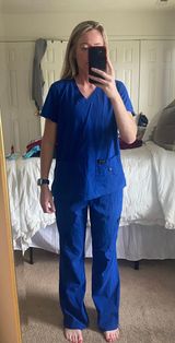 Koi Blue Scrubs Photo 0
