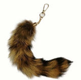 Raccoon fur keychain with brown and black striped tail #raccoon #animal Photo 0