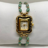 Women’s watch 21mm case quartz analog green gold tone beaded bracelet 7” running Photo 0