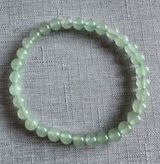 Jade EUC green beaded stretch bracelet. Appx. 6mm beads of genuine gemstone. Photo 0