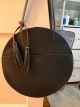 Anthropologie Round Black Leather Shoulder Bag with Tassel Accent Photo 0