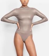 SKIMS Faux Leather Bodysuit Photo 0