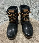 Women’s Sperry Black and Brown Duck Boots Photo 0