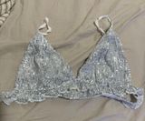 Shimmer in style with this sequin embellished silver bralette. Perfect for adding a touch of sparkle to your intimate collection. I WILL BUNDLE ON BRALETTES Photo 0