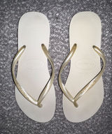 Havaianas Women's Flip Flops in Pearl White with Gold Straps Photo 0
