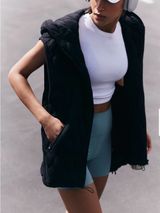 FP Movement by Free People Black Quilted Oversized Sleeveless Hooded Vest Photo 0